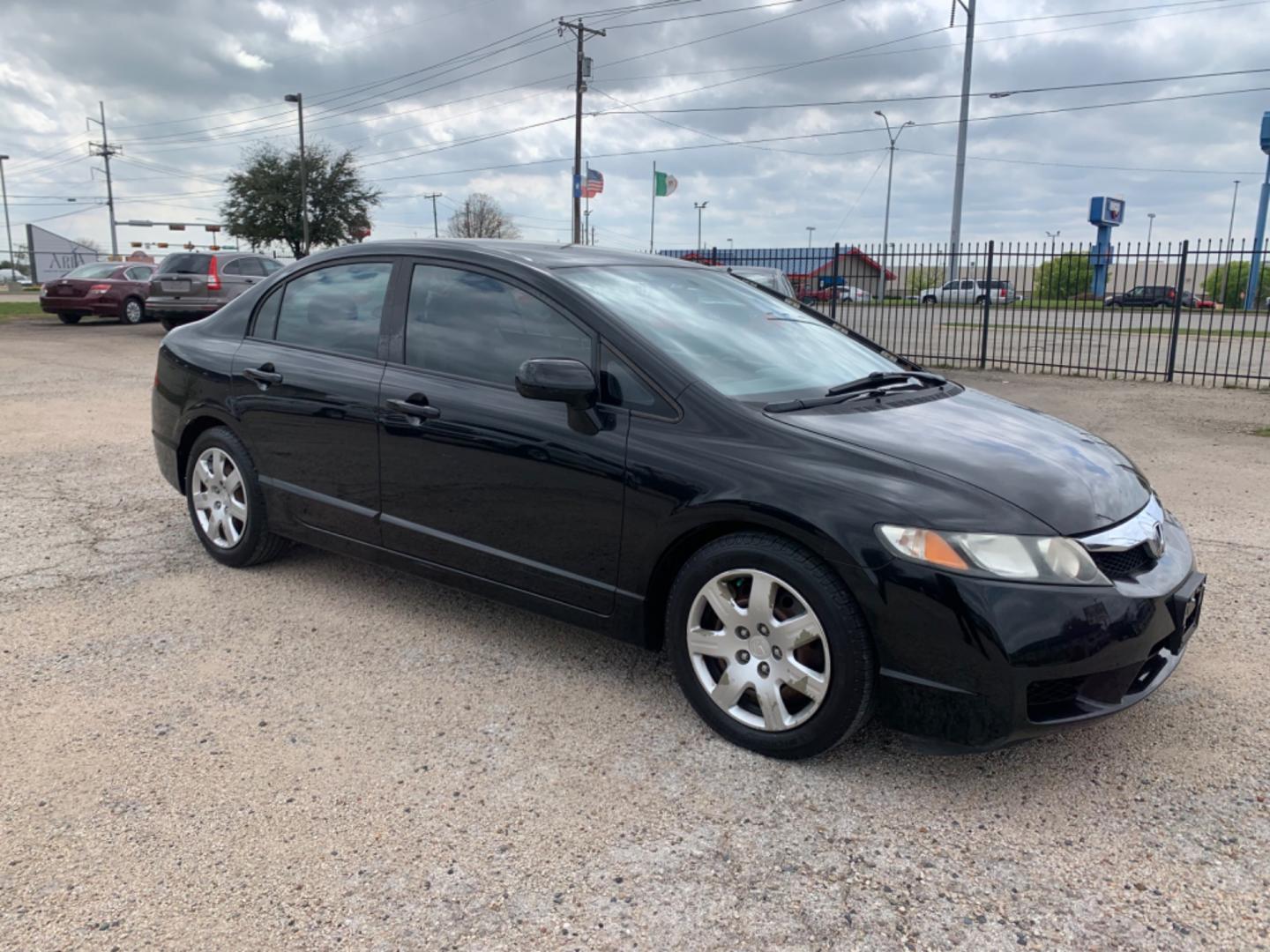 2010 Black /gray Honda Civic LX Sedan (19XFA1F56AE) with an 1.8L L4 SOHC 16V engine, Automatic transmission, located at 1830 North Belt Line Road, Irving, TX, 75061, (469) 524-0199, 32.834373, -96.993584 - Photo#8